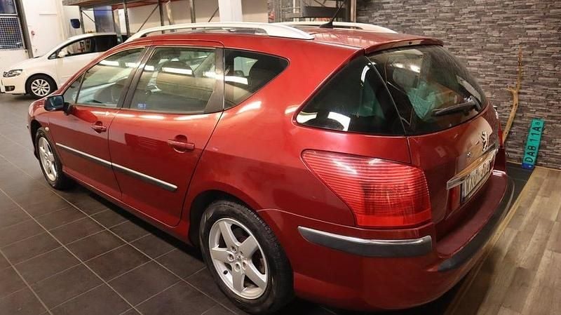 Begagnad Peugeot 407 136 HK (100 kW) 2005 Röd Kombi