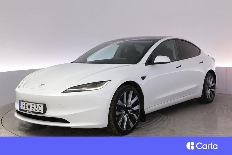 Vit Begagnad 2024 Tesla Model 3 Long Range AWD Sedan | 484 900 kr - Bild 1/4