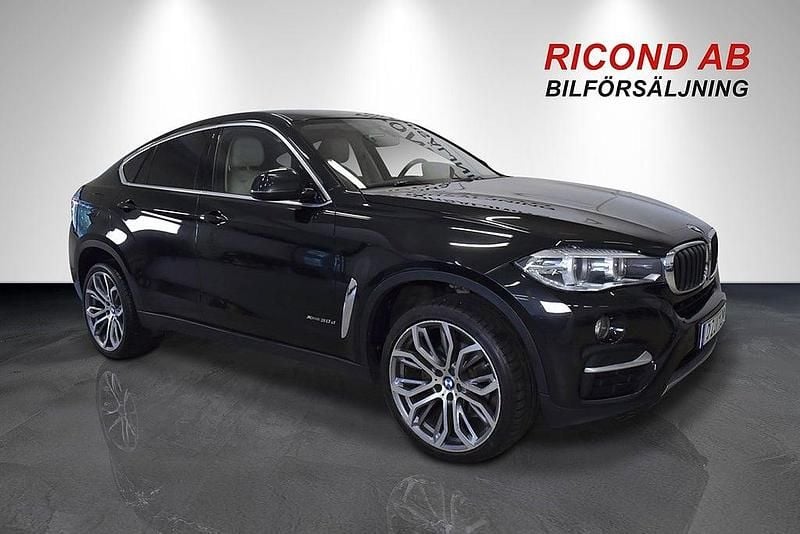 Svart (safir svartmet) Begagnad 2014 BMW X6 Sport Line SUV | 309 900 kr (Marknadspris) - Bild 1/4