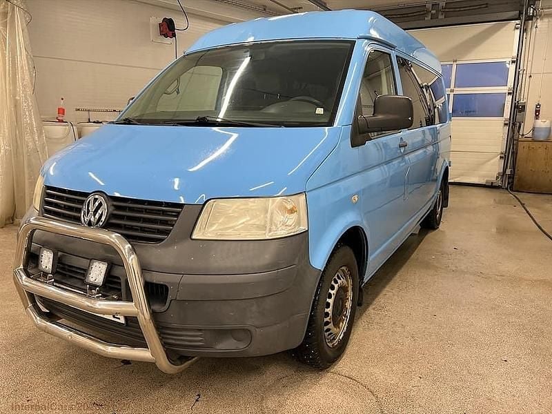 Mörkblå Begagnad 2014 VW Caravelle Minibuss | 77 500 kr - Bild 1/4