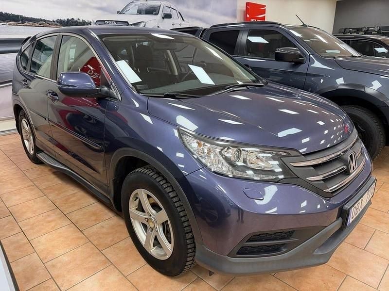 Blå Begagnad 2013 Honda CR-V Comfort SUV | 120 000 kr (Marknadspris) - Bild 1/4