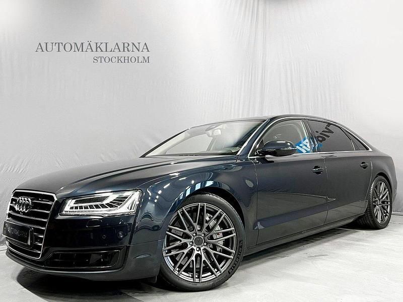 Mörkblå Begagnad 2014 Audi A8L Comfort Sedan | 349 000 kr - Bild 1/4