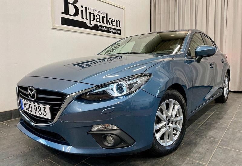 Blå Begagnad 2016 Mazda 3 Inclusive Halvkombi | 179 900 kr (Marknadspris) - Bild 1/3