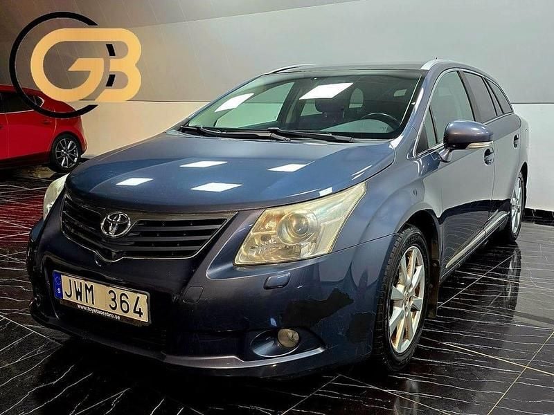Mörkblå (blå) Begagnad 2009 Toyota Avensis Executive Kombi | 69 900 kr (Marknadspris) - Bild 1/4