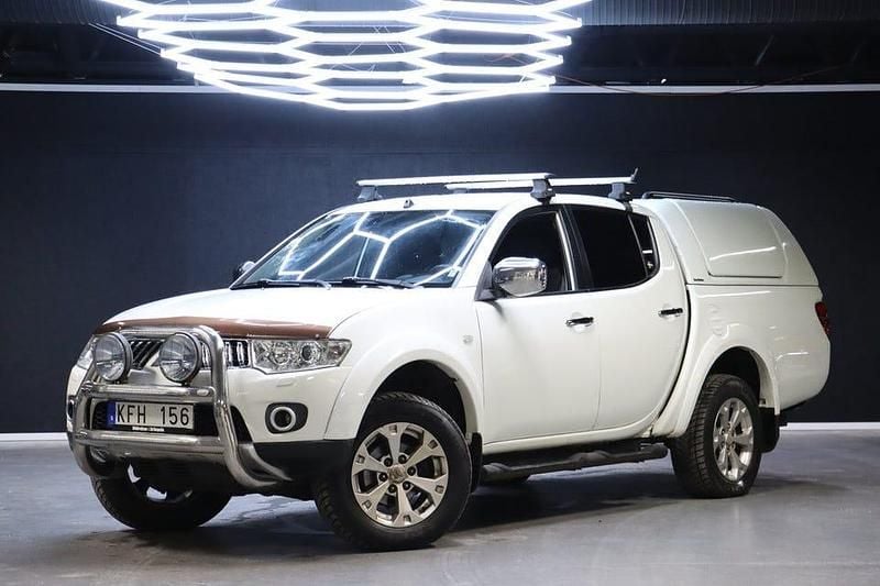 Vit Begagnad 2011 Mitsubishi L200 Pickup | 114 900 kr (Marknadspris) - Bild 1/4