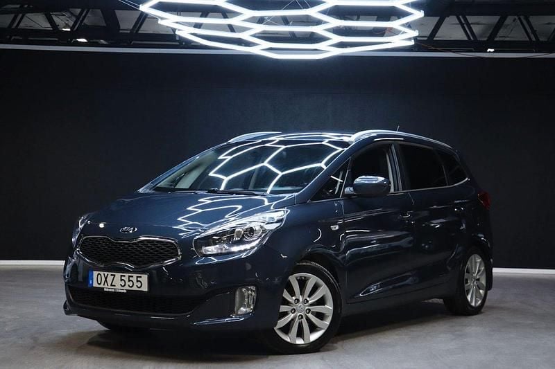Blå Begagnad 2016 Kia Carens Minibuss | 169 900 kr (Marknadspris) - Bild 1/4