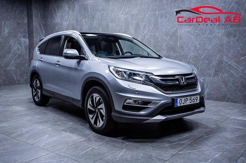 Silver Begagnad 2016 Honda CR-V Executive SUV | 174 800 kr (Marknadspris) - Bild 1/4