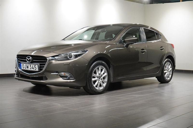 Brun Begagnad 2016 Mazda 3 Vision Halvkombi | 119 800 kr (Marknadspris) - Bild 1/4