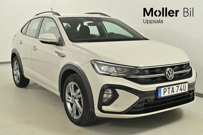 Grå (ascot grey) Begagnad 2023 VW Taigo R-line SUV | 264 900 kr (Marknadspris) - Bild 1/4