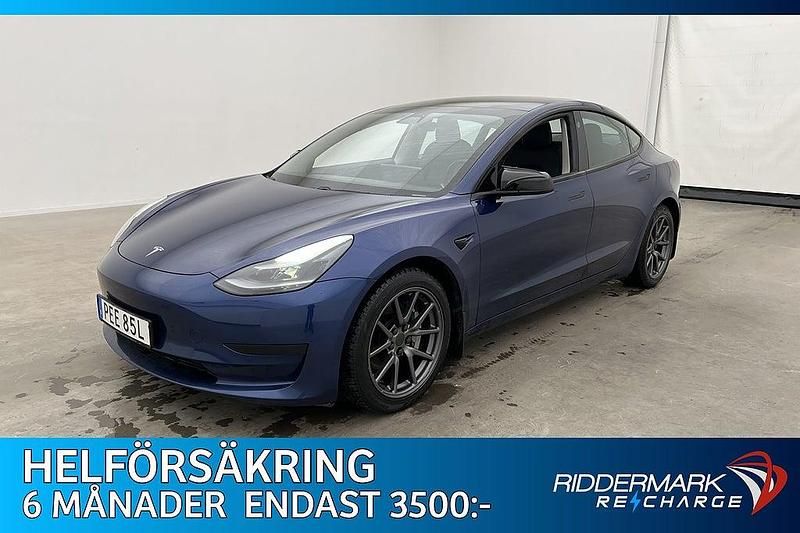 Blå Begagnad 2021 Tesla Model 3 Standard Range Plus Sedan | 219 800 kr (Marknadspris) - Bild 1/3