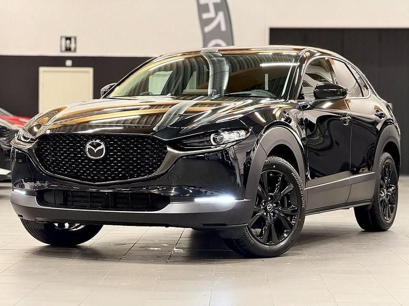 Svart Ny 2025 Mazda CX-30 Nagisa SUV | 374 500 kr (Marknadspris) - Bild 1/4