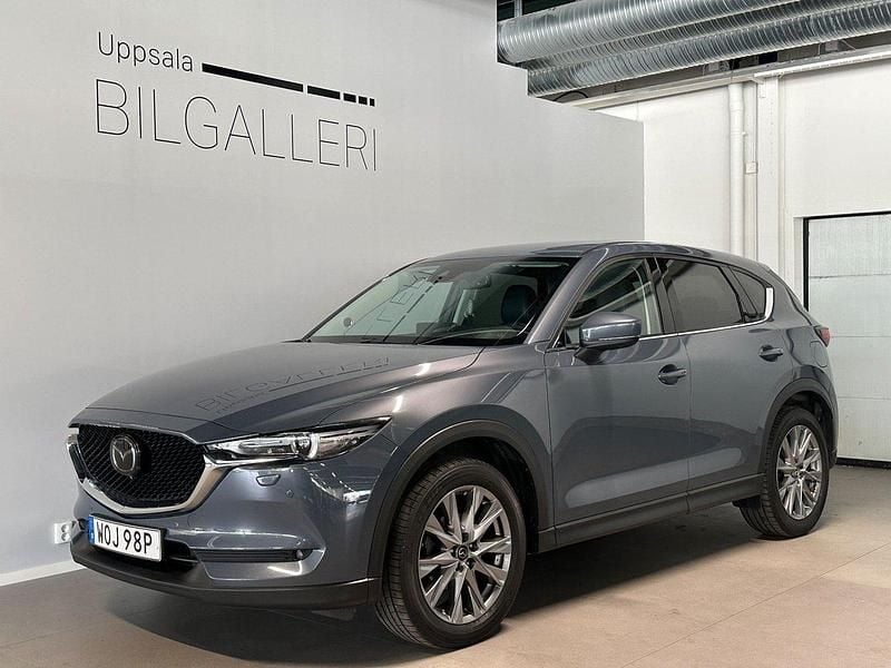 Grå Begagnad 2021 Mazda CX-5 Optimum SUV | 289 900 kr (Marknadspris) - Bild 1/4
