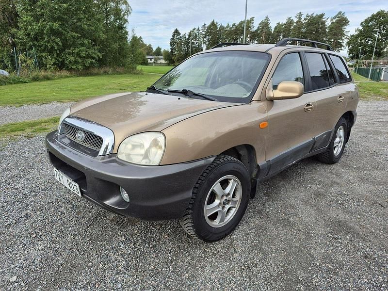 Brun Begagnad 2003 Hyundai Santa Fe SUV | 38 900 kr - Bild 1/4