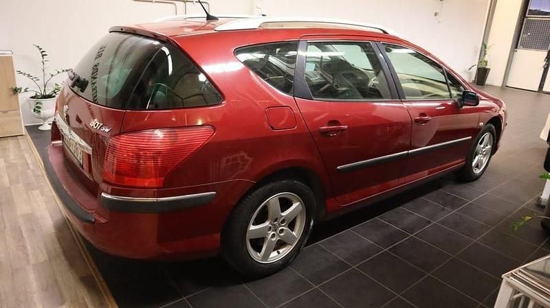 Begagnad Peugeot 407 136 HK (100 kW) 2005 Röd Kombi