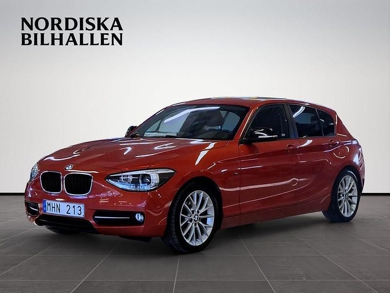 Begagnad BMW 118 Sport Line 143 HK (105 kW) 2012 Orange Halvkombi