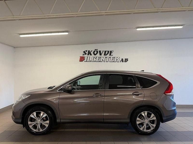 Ljusbrun (brunmetallic) Begagnad 2014 Honda CR-V Executive SUV | 167 500 kr (Marknadspris) - Bild 1/4
