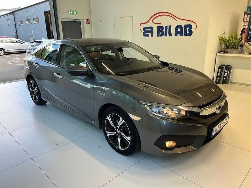 Mörkgrå (grå) Begagnad 2018 Honda Civic Elegance Sedan | 134 900 kr (Marknadspris) - Bild 1/3