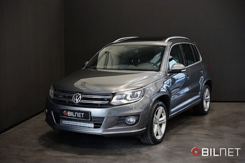 Mörkgrå (grå) Begagnad 2016 VW Tiguan R-line SUV | 179 900 kr (Superpris) - Bild 1/4
