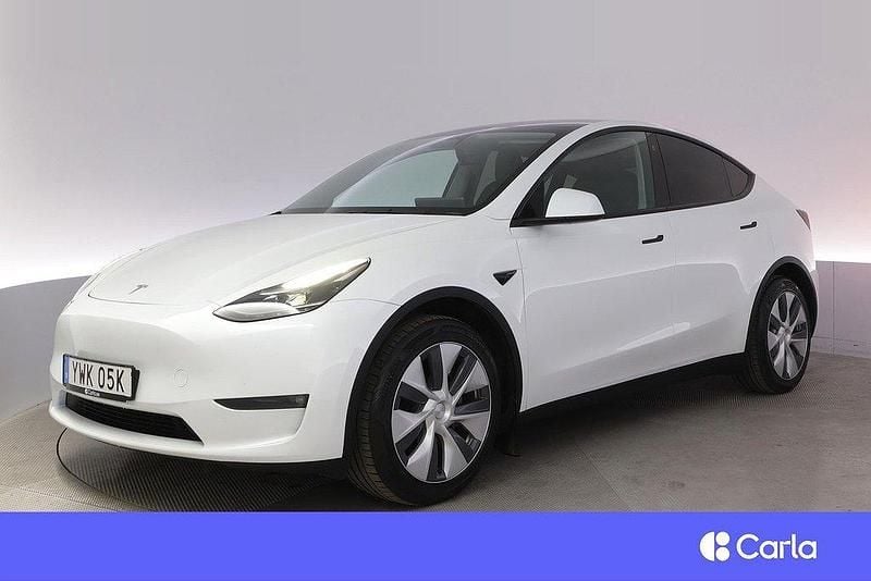Vit Begagnad 2023 Tesla Model Y Long Range AWD SUV | 444 900 kr - Bild 1/4