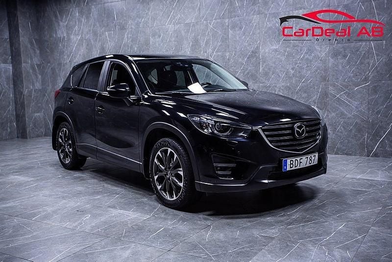 Svart Begagnad 2015 Mazda CX-5 SUV | 109 800 kr (Marknadspris) - Bild 1/4