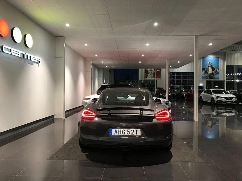 Begagnad Porsche Cayman 275 HK (202 kW) 2013 Agate grey metallic/svart läder Sportkupé