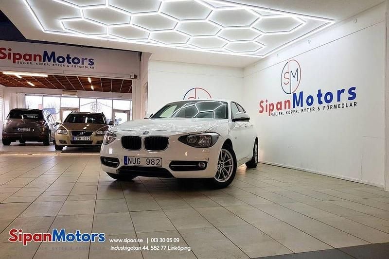 Vit Begagnad 2011 BMW 118 Sport Line Halvkombi | 89 900 kr (Lite dyr) - Bild 1/4
