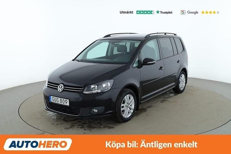 Svart Begagnad 2015 VW Touran Minibuss | 125 000 kr (Marknadspris) - Bild 1/4