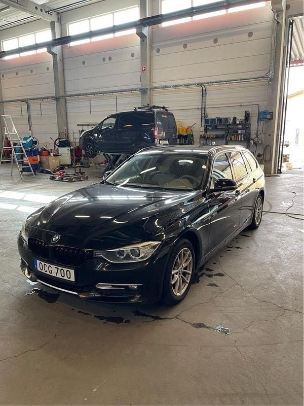 Svart Begagnad 2014 BMW 320 Kombi | 82 000 kr (Superpris) - Bild 1/4