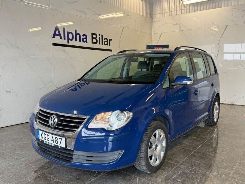 Blå Begagnad 2009 VW Touran Trendline Minibuss | 59 900 kr - Bild 1/4