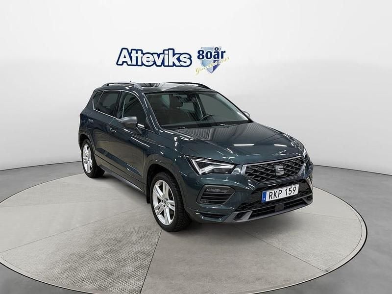 Mörkgrön Begagnad 2021 Seat Ateca FR SUV | 259 500 kr (Marknadspris) - Bild 1/4