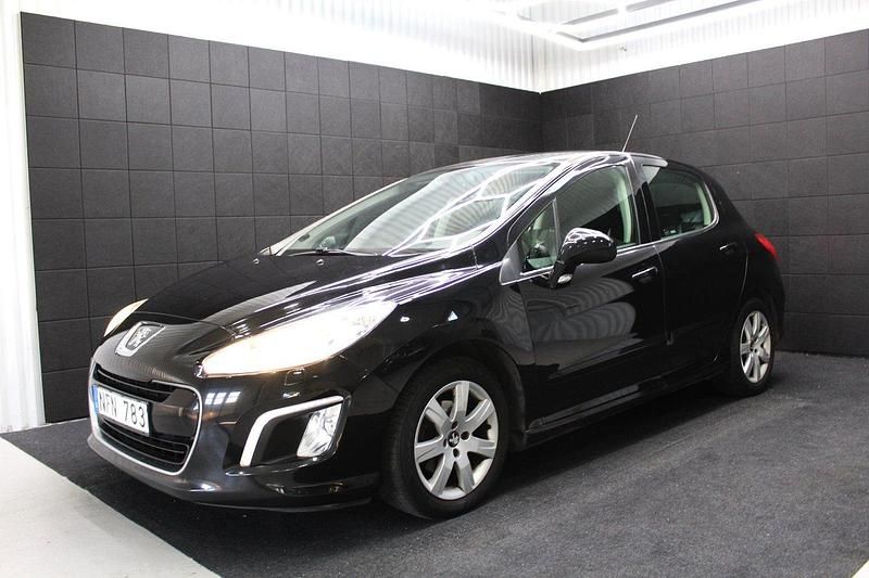 Svart Begagnad 2012 Peugeot 308 Halvkombi | 49 000 kr (Marknadspris) - Bild 1/4