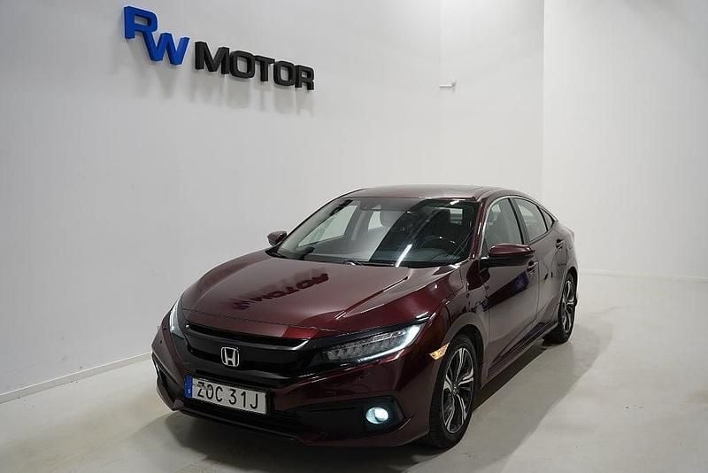 Begagnad Honda Civic Prestige 182 HK (133 kW) 2019 Röd Sedan
