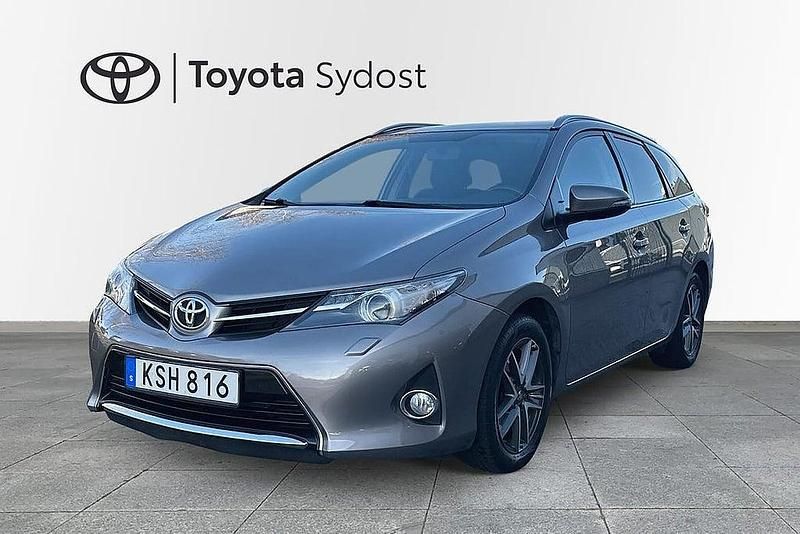 Brun Begagnad 2014 Toyota Auris Touring Sports Edition Kombi | 132 000 kr (Marknadspris) - Bild 1/4