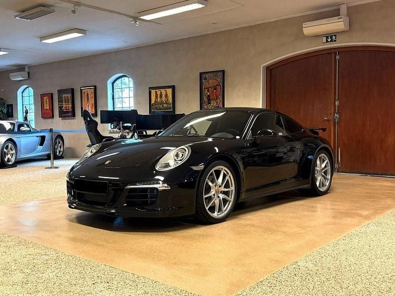 Svart Begagnad 2015 Porsche 911 Carrera 4 Sportkupé | 1 025 000 kr - Bild 1/4