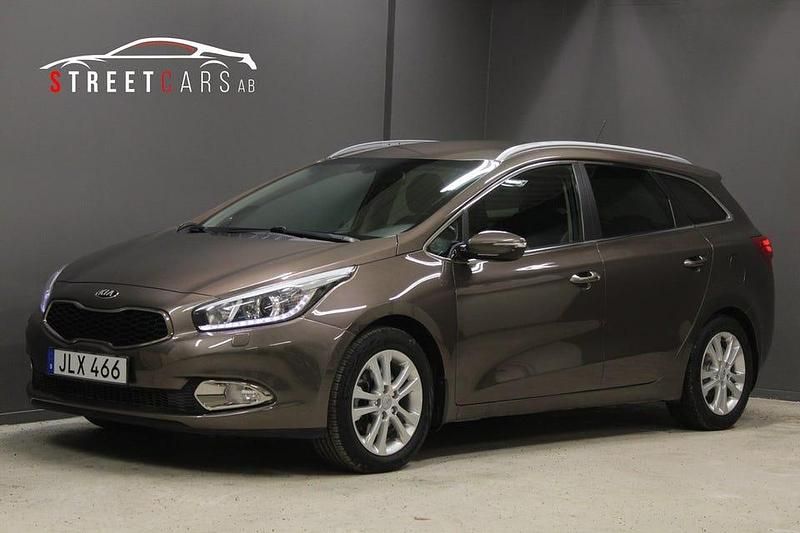 Grön Begagnad 2014 Kia Ceed Sportswagon EX Kombi | 139 900 kr (Marknadspris) - Bild 1/4