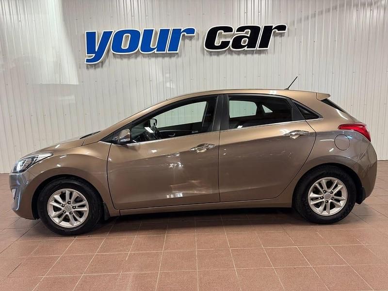 Begagnad Hyundai i30 Premium 128 HK (94 kW) 2014 Brun Halvkombi