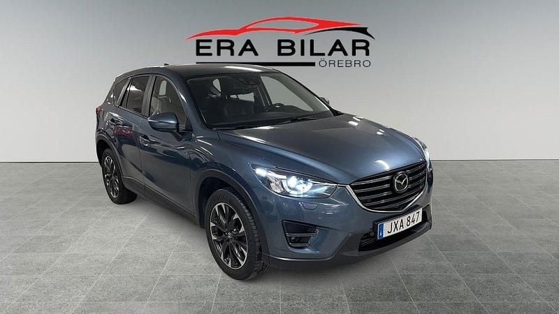 Blå Begagnad 2016 Mazda CX-5 SUV | 139 800 kr (Marknadspris) - Bild 1/4