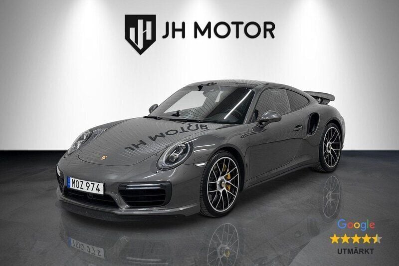 Mörkgrå Begagnad 2018 Porsche 911 Turbo S Sportkupé | 1 749 900 kr - Bild 1/4