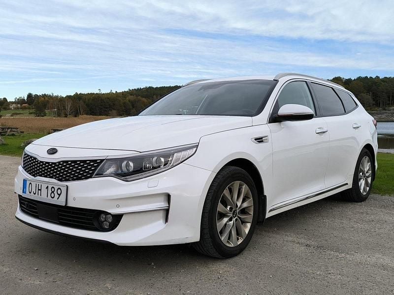 Vit Begagnad 2018 Kia Optima Kombi | 149 000 kr (Marknadspris) - Bild 1/4