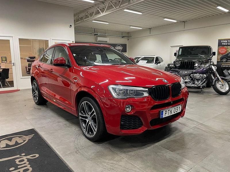 Röd Begagnad 2015 BMW X4 M Sport SUV | 234 900 kr (Superpris) - Bild 1/4