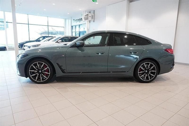 Begagnad BMW i4 Comfort Edition 250 kW (340 HK) 2025 Grön Sedan