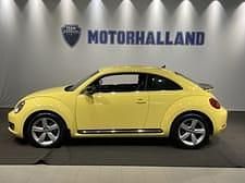 Gul Begagnad 2012 VW Beetle GT Halvkombi | 139 900 kr (Marknadspris) - Bild 1/4