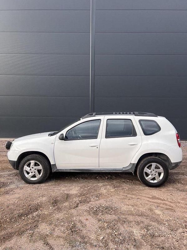 Vit Begagnad 2015 Dacia Duster SUV | 75 000 kr (Marknadspris) - Bild 1/4