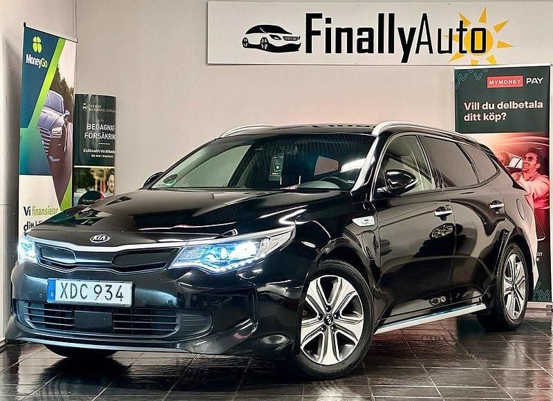 Svart Begagnad 2018 Kia Optima Hybrid Sport Sedan | 124 900 kr (Marknadspris) - Bild 1/4