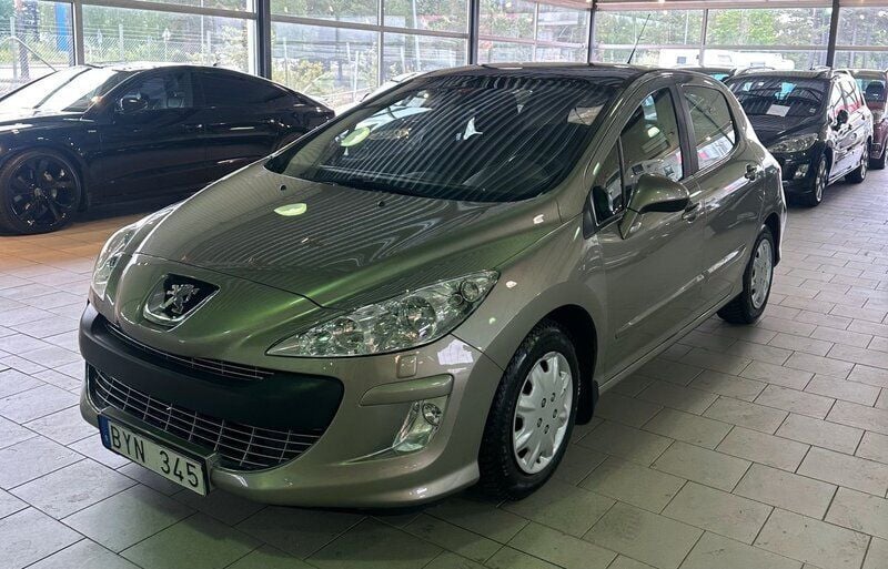 Grå Begagnad 2010 Peugeot 308 Halvkombi | 54 900 kr (Marknadspris) - Bild 1/4
