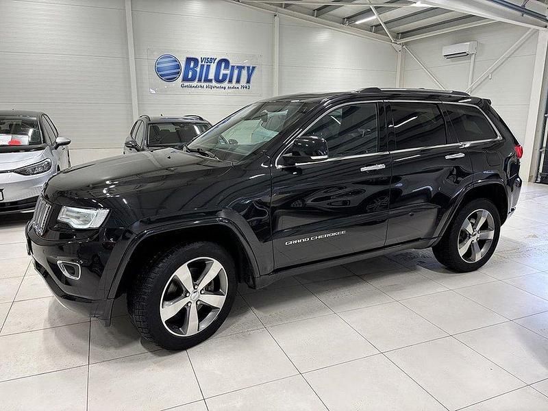 Svart Begagnad 2015 Jeep Grand Cherokee SUV | 199 900 kr (Marknadspris) - Bild 1/4