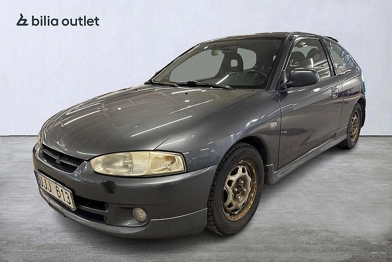 Begagnad Mitsubishi Colt 103 HK (75 kW) 2003 Mgrå Halvkombi