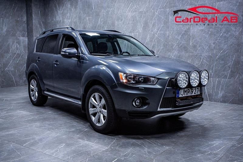 Grå Begagnad 2011 Mitsubishi Outlander SUV | 64 800 kr - Bild 1/4