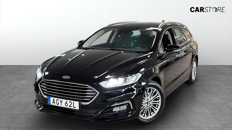 Svart (black) Begagnad 2022 Ford Mondeo Titanium Kombi | 204 900 kr - Bild 1/4