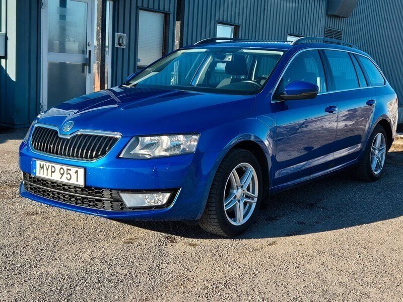 Blå Begagnad 2014 Skoda Octavia Ambition Kombi | 89 800 kr (Marknadspris) - Bild 1/4